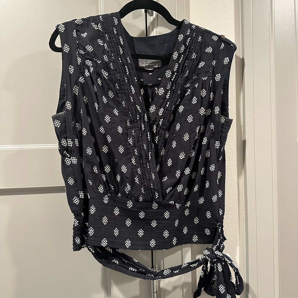 Anthropology wrap top! Black with white details. Gathered waist.